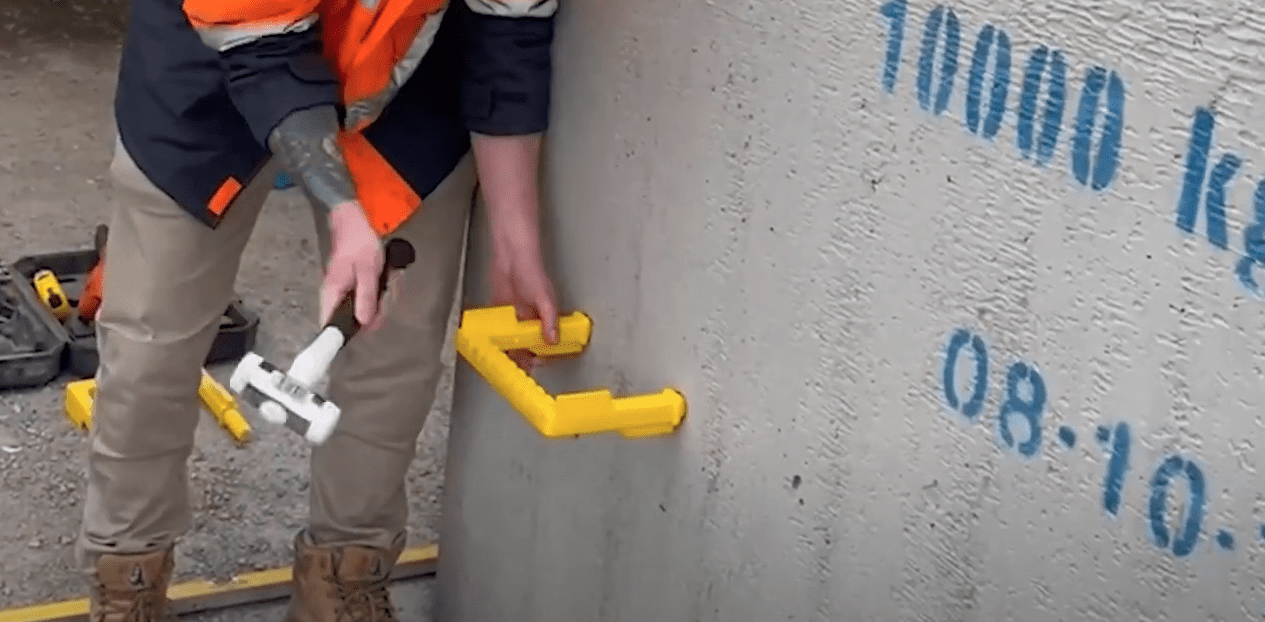 Man banging in Yeti Step with a mallet